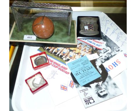 A novelty football clock with ball and goal posts; a Showbiz XI, including Tommy Steele, Billy Wright, etc.; footballing meda