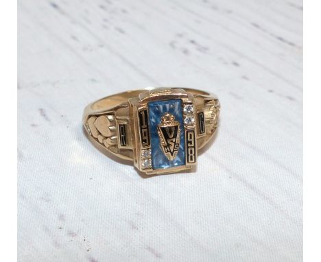 A Cowboy Rodeo ring dated 1998 with raised black and blue enamel decoration, inscribed, stamped '10k, 4.6gm gross 