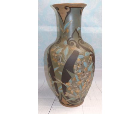 A Doulton Lambeth baluster vase by Edith D, with incised and raised enamel decoration of flowers in black, gold and turquoise