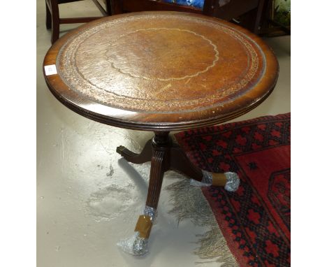 A mahogany reproduction circular occasional table on tripod base with leather insert; a similar drop end occasional table wit