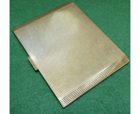 A 9 carat hallmarked gold engine turned rectangular cigarette case, 158.5 gm