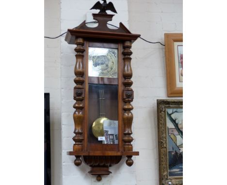 A 19th century stained walnut Vienna style clock, spring driven striking movement