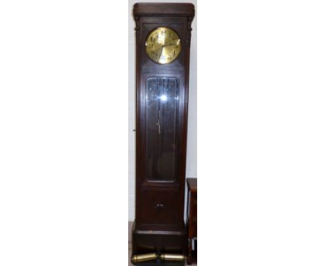 A 1930's continental oak longcase clock with weight driven striking movement (top panel a.f.)