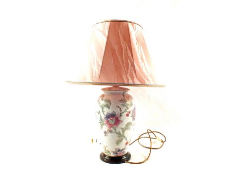 A floral pottery table lamp