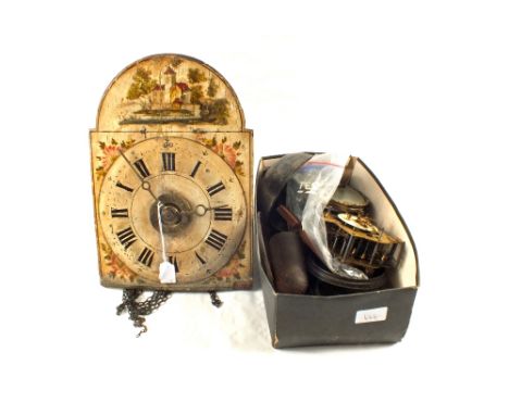 A Postmans alarm clock and a box of clock spares