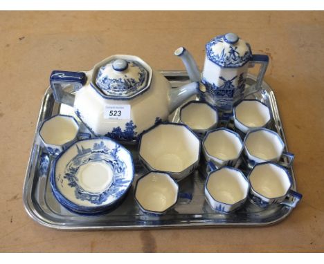 A Royal Doulton Norfolk octagonal coffee set and a teapot