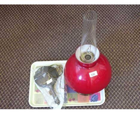 An Aladdin oil lamp, a Silver hand mirror and other items