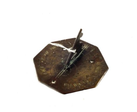 A miniature 18th Century octagonal Brass sundial with engraved decoration and Roman numerals, 3 1/2" wide