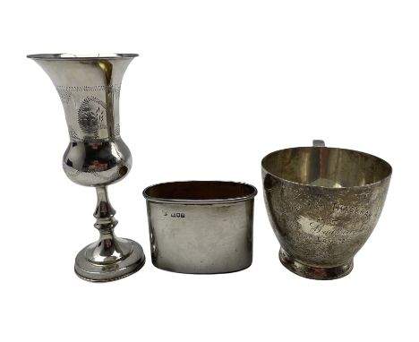 Silver Kiddush cup with engraved decoration H13cm London 1921, silver flask cup and a silver christening mug with inscription