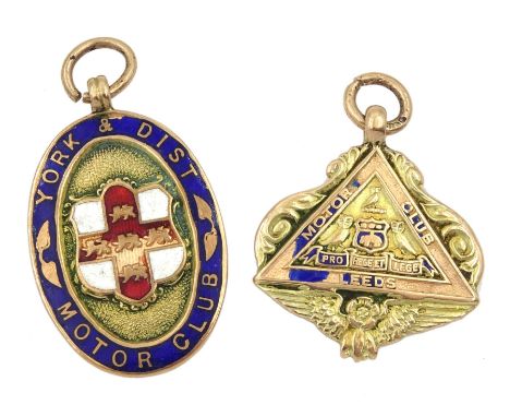 Two early 20th century gold and enamel Leeds and York &amp; Dist Motor Club presentation pendant medallions, both hallmarked,