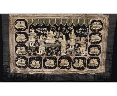 A Burmese Kalaga embroidered silk tapestry, depicting a royal ceremony within a border of dragons, 103cm x 155cm