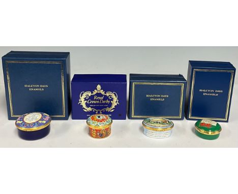 An assortment of Halcyon Days enamel pill boxes, comprising Golden Jubilee, 1952-2002; Prince William of Wales on his 18th bi