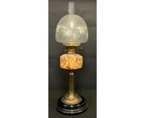 An Edwardian oil lamp, orange and white marbleized glass reservoir, shaped shade, 60.5cm high overall
