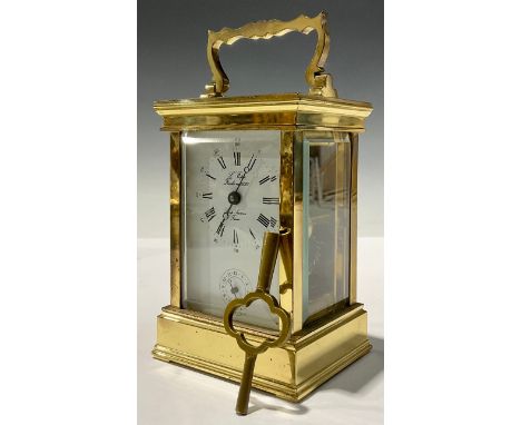 A French L'Epee brass carriage clock, Roman and Arabic numerals on white dial, alarm setting chapter, 15.5cm high over handle