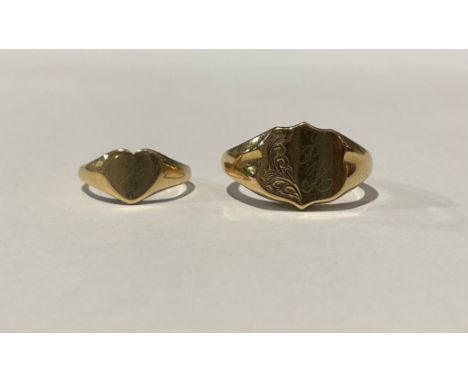 A 9ct gold signet ring, size V; another, size K/L, 8.4g gross (2)