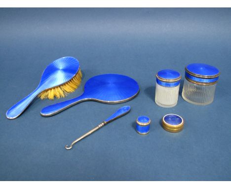 A Hallmarked Silver Mounted Blue Enamel Part Dressing Table Set, H Matthews, Birmingham 1926, including two lidded pots, hair