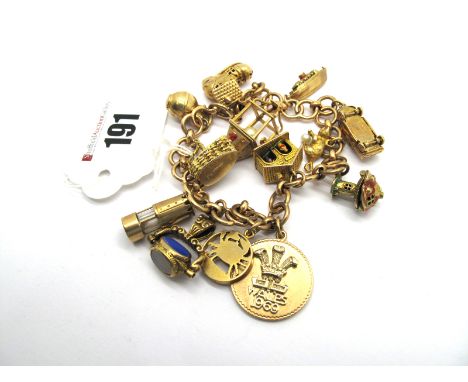 A 9ct Gold Charm Bracelet, suspending numerous novelty charm pendants, including a lantern, miner's lamp "Wales 1969", car, b