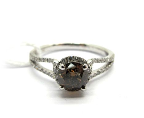 A Modern 18ct White Gold Fancy Chocolate Diamond Single Stone Dress Ring, circular four claw set to the centre, within halo o