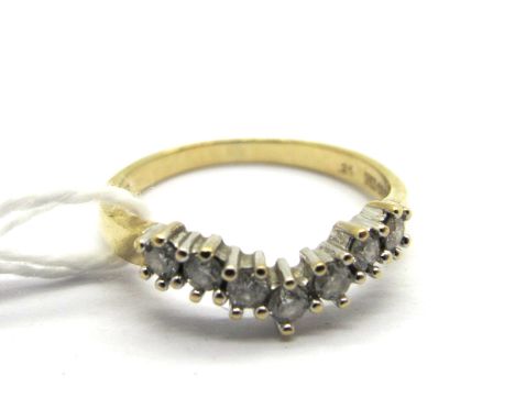 A Modern 9ct Gold Diamond Set Wishbone Ring, claw set throughout, stamped ".25".