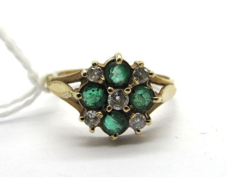 A Modern 9ct Gold Emerald and Diamond Cluster Dress Ring, claw set throughout.