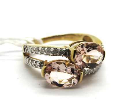 A Modern 9ct Gold Morganite and Diamond Set Dress Ring, of two row design. *ES Jewellery Insurance Valuation dated 13/07/17 £