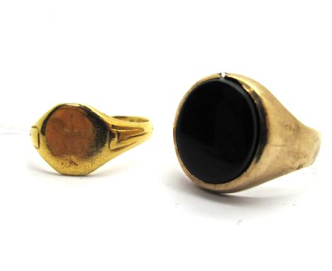 An 18ct Gold Signet Style Ring; together with a 9ct gold gent's ring (damages). (2)