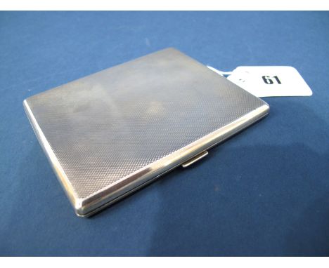 A Slim Hallmarked Silver Cigarette Case, SJR, London 1936, of rectangular form, allover engine turned, inside engraved "H.L. 