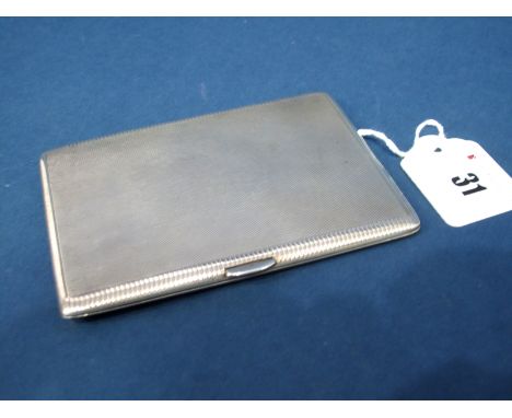 A Slim Hallmarked Silver Cigarette Case, CSG&amp;CO, Birmingham 1954, of rectangular form, allover engine turned, 12.1cm.