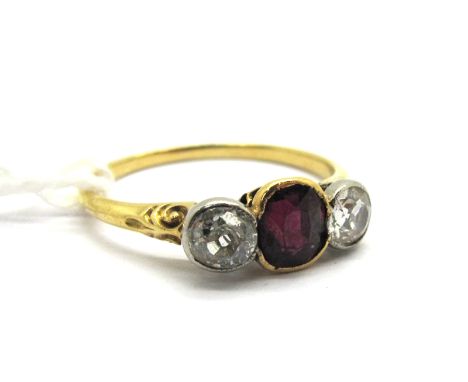 A Diamond Set Ring, graduated circular collet rubover set with two old cut diamonds.