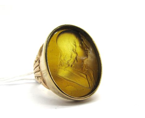 A 9ct Gold Intaglio Cameo Style Gent's Panel Ring, depicting gentleman with long hair, oval collet set between textured taper