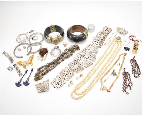 A collection of assorted 20th Century jewellery. The lot to include a silver plated belt with pierced and scrolled detailing,