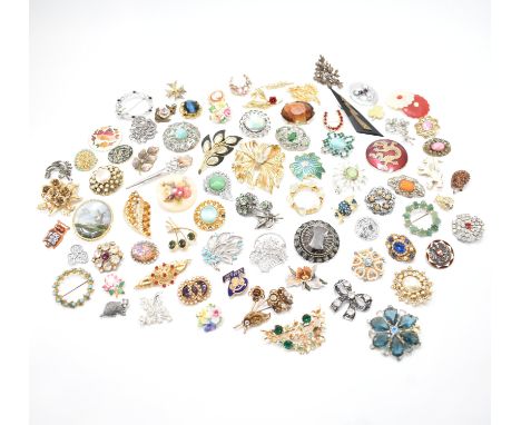 A collection of assorted vintage 20th Century brooches. The lot to include enamelled, stone set, Scottish style and a ceramic