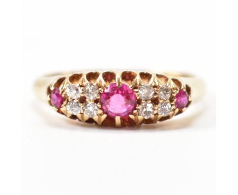 An early 20th Century antique hallmarked 18ct gold ruby and diamond ring. The ring being set with three round cut rubies and 