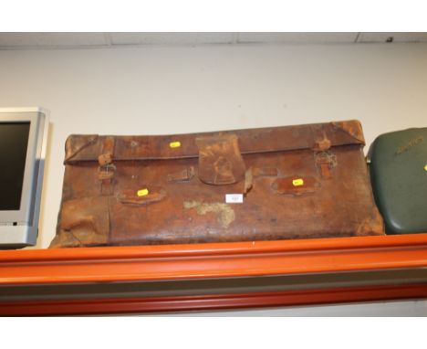 A LARGE VICTORIAN LEATHER TRUNK / SUITCASE