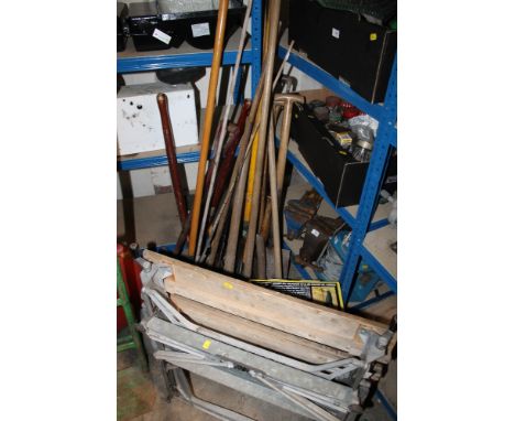 A SELECTION OF GARDEN TOOLS WITH A WORKBENCH '& A STRIMMER
