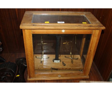 A CASED SET OF VINTAGE SCALES BY PHILLIP HARRIS