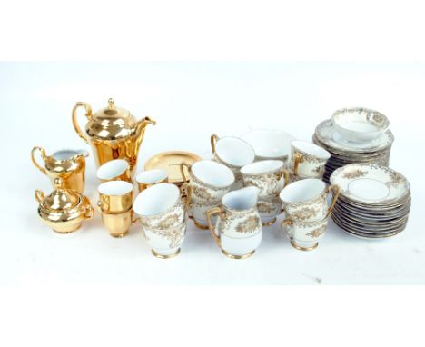 A quantity of twelve setting Meito floral decorated teaware to include cups, saucers, milk and sugar jugs, etc and a Thun cof