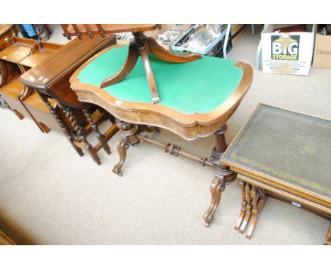 A Victorian walnut card table, lacking the top hinged surface and raised on swept cabriole legs, width 94cm (af).