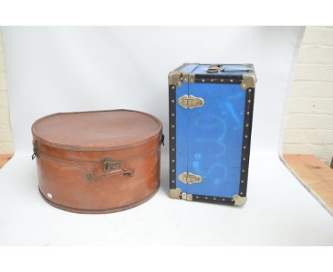 A large Rexhide faux leather circular hat box with internal leather straps, diameter 39.5cm and a small blue travelling trunk