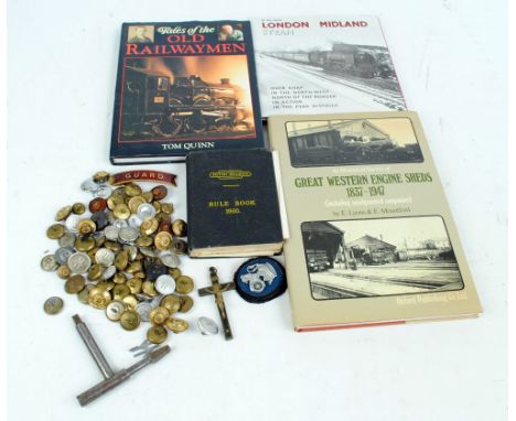 A small collection of railway interest ephemera to include a quantity of British railway buttons, a 1950 rulebook and three r