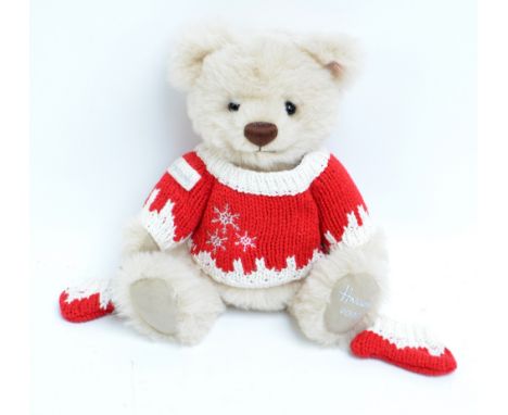 A Steiff button-in-ear 'Oscar' 2008 Christmas teddy bear for Harrods, with growler and cream mohair, in knitted jumper with g