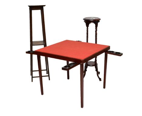 A folding card table with red felt top and four hinged chip trays on square tapering legs, height 66cm, also an oak Arts and 