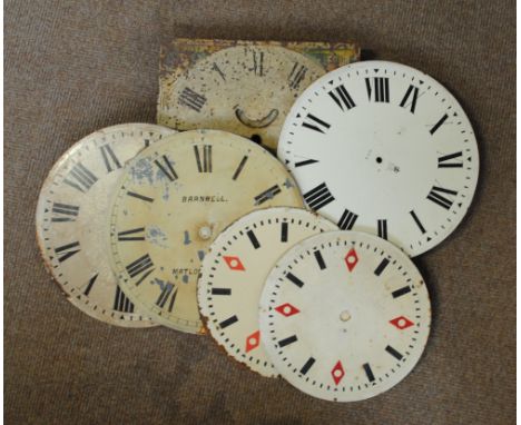 A group of early 20th century circular wall clock enamel dials including Barnwell, Matlock Bridge and a 19th century longcase