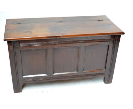 An early 18th century oak triple-panel coffer.