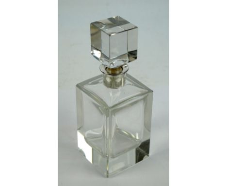 An Elizabeth II hallmarked silver collared and clear glass square section decanter, London 1975, height 25cm.