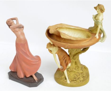 A c.1900 Amphora type porcelain figural footed bowl moulded as two seated girls and large nest on naturalistic base, impresse