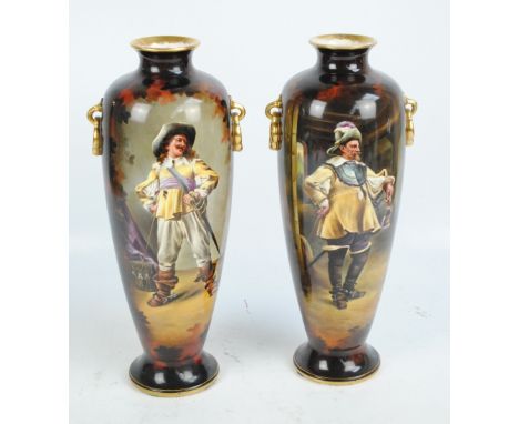 ROYAL BONN; a pair of twin handled vases of baluster form, each decorated with a chevalier and landscape to opposing panel, b