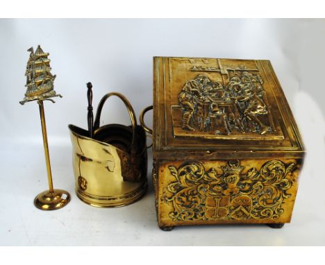A quantity of brass including a coal bin, companion stand, coal scuttle, circular dish, modern miniature warming pan, and a b