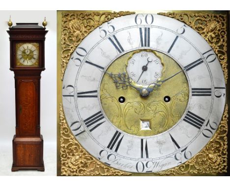 A George III oak and mahogany crossbanded longcase clock, the moulded cornice with fretwork panel above 13" square brass dial