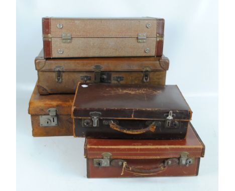 Five vintage suitcases in various sizes including four leather examples, the largest 60 x 40 x 16cm (5).